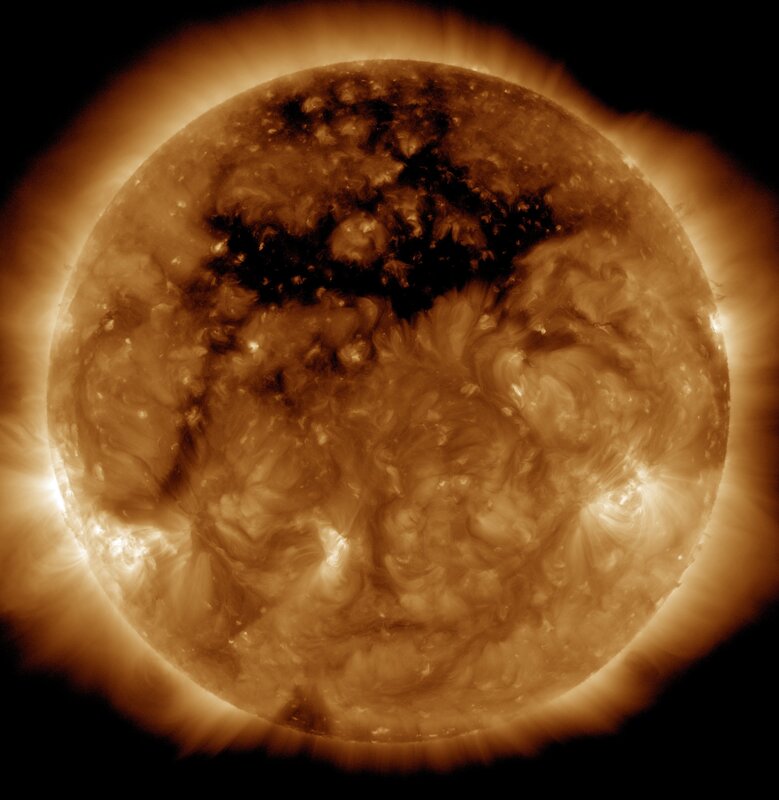 Solar Surface with Sunspots — Orange