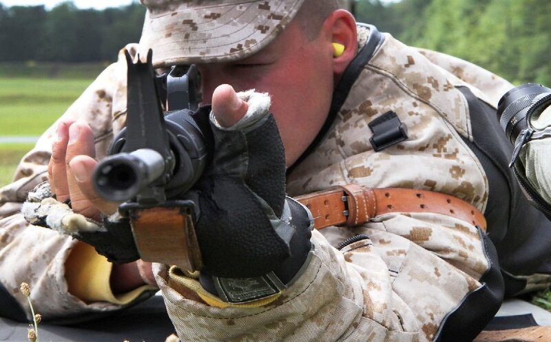 Soldier Aiming Rifle — Tan, Focused