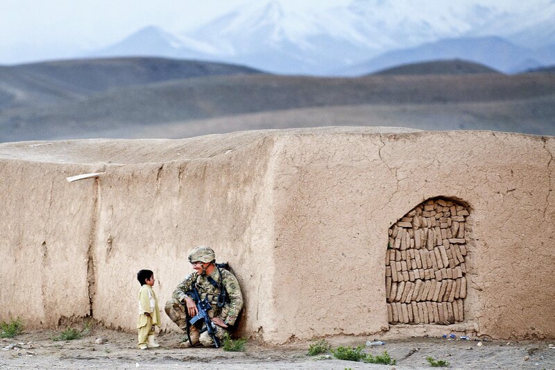 Soldier and child in Afghanistan