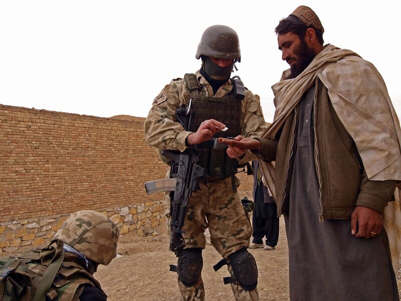 Soldier and Man Interacting