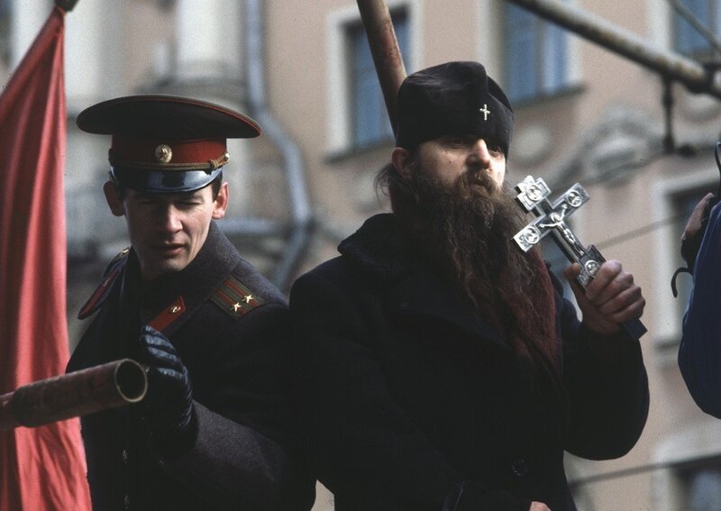 Soldier and priest at a public event