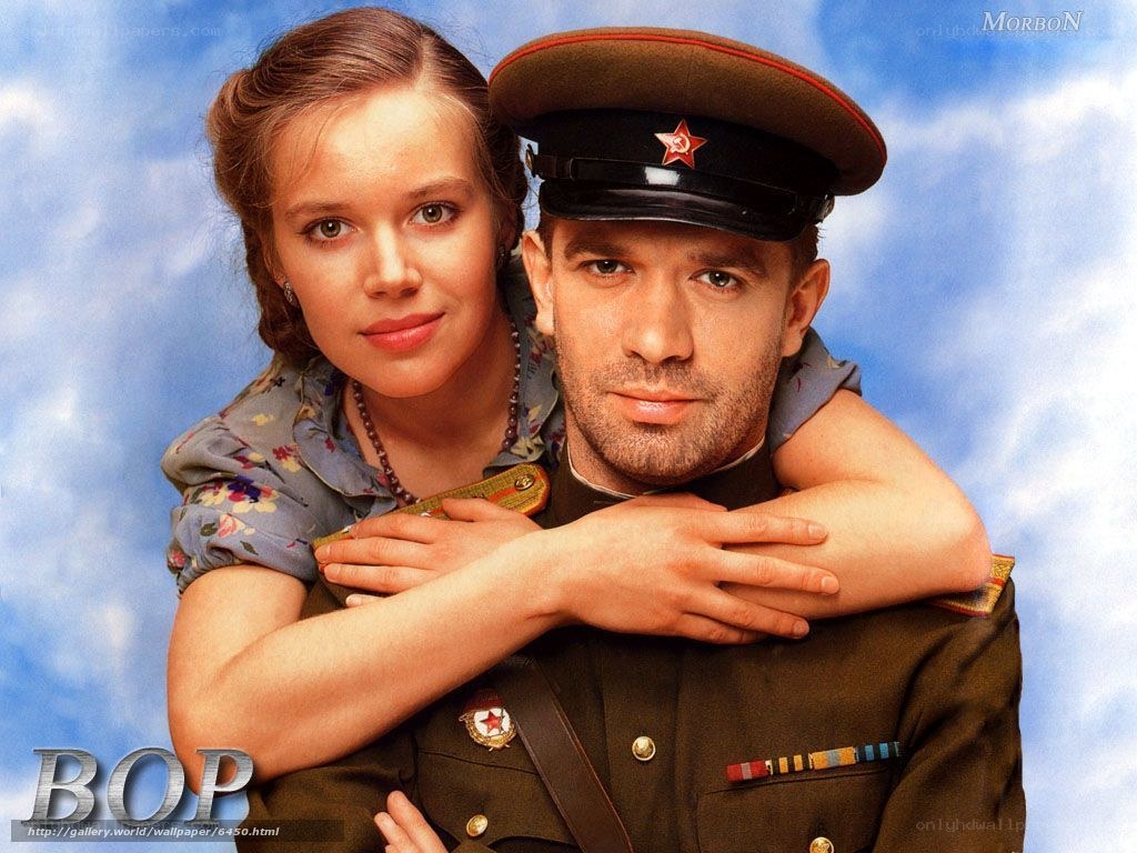 Soldier and woman embracing