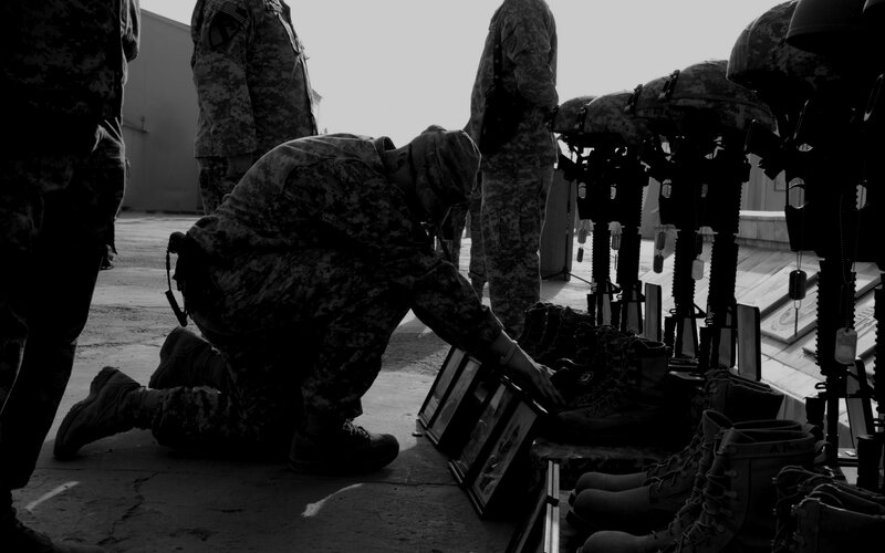 Soldier at memorial tribute
