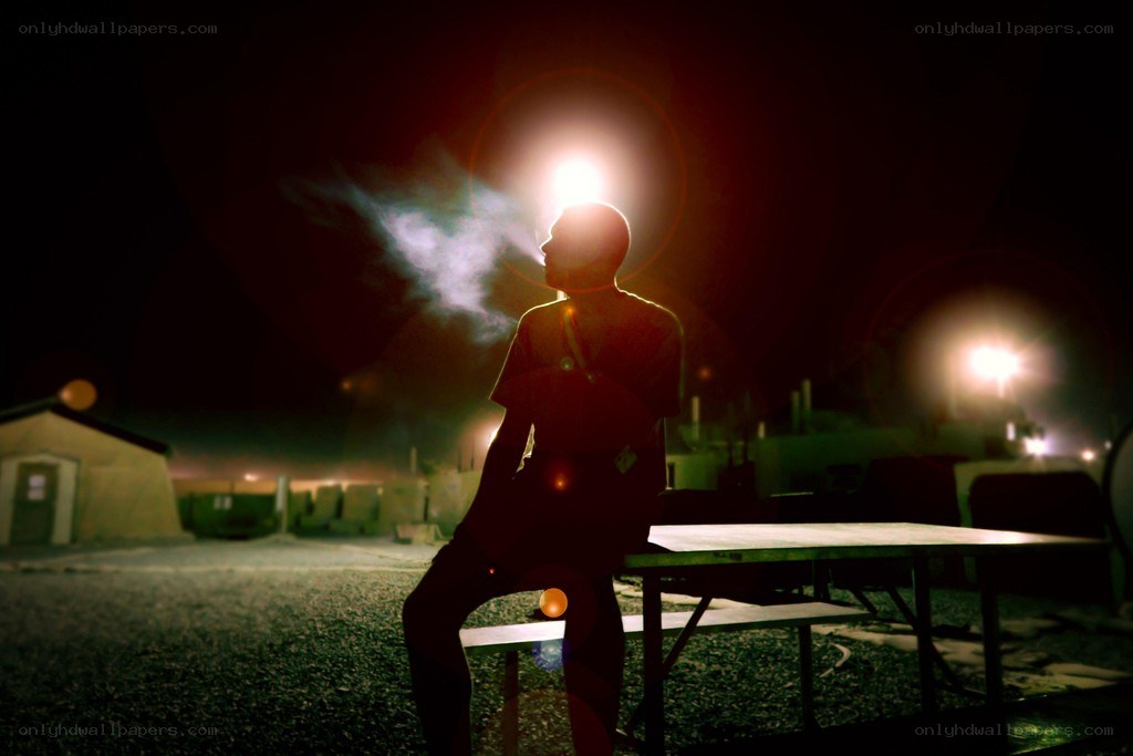 Soldier at night with smoke