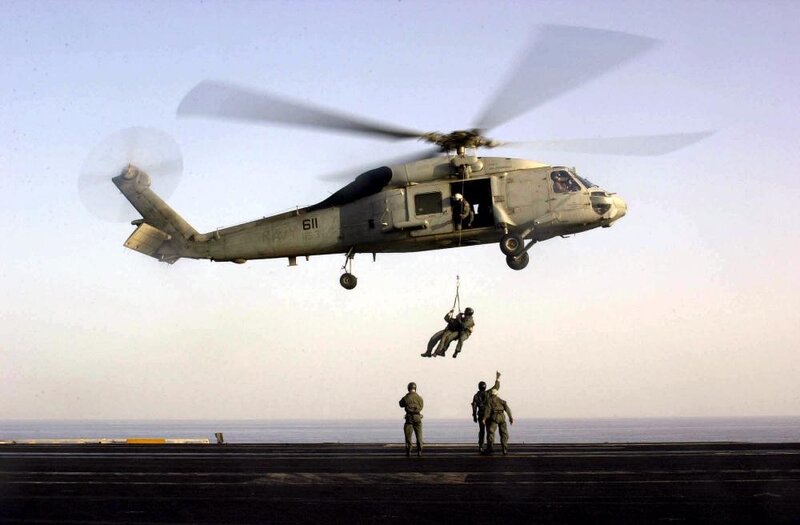 Soldier Being Hoisted by Helicopter