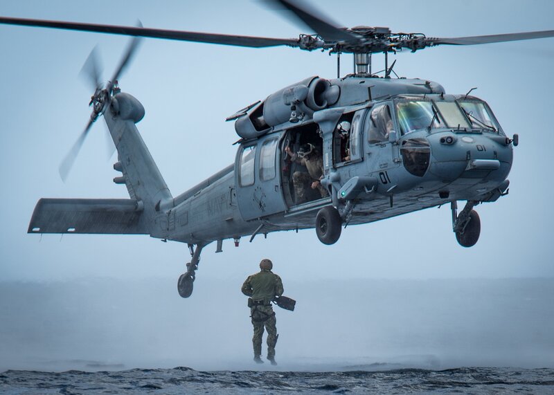 Soldier Boarding Helicopter — Gray