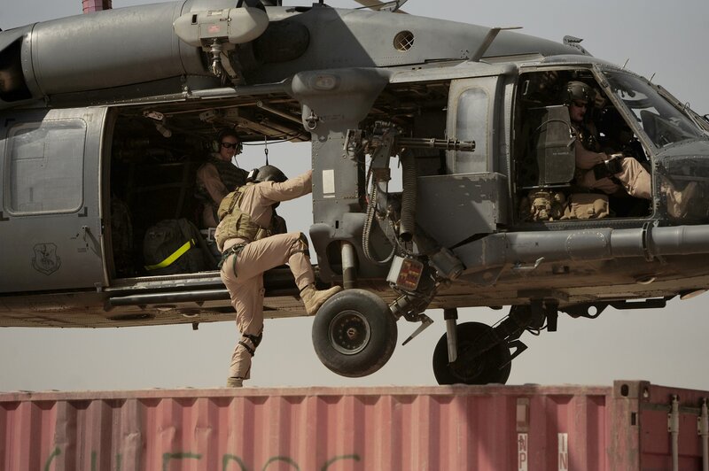 Soldier boarding helicopter