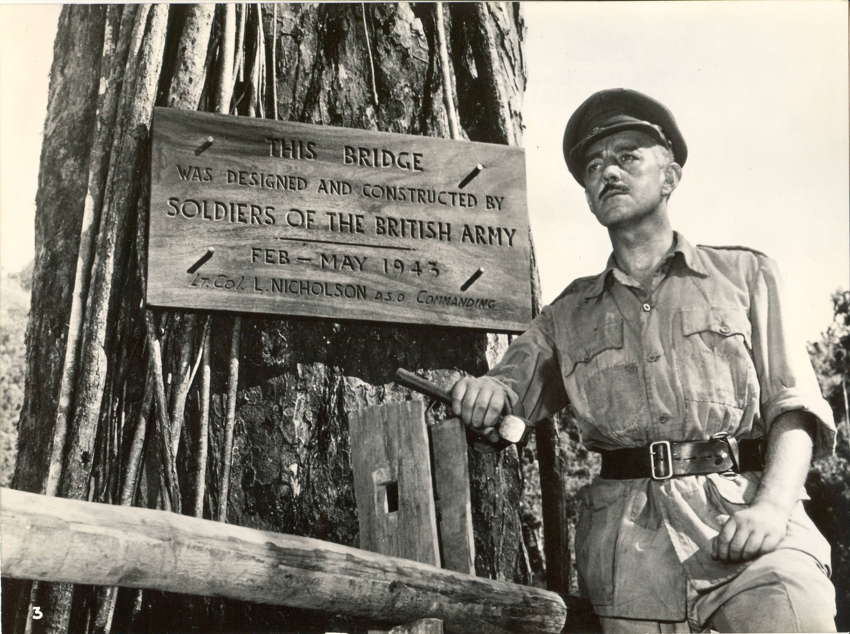 Soldier by bridge plaque