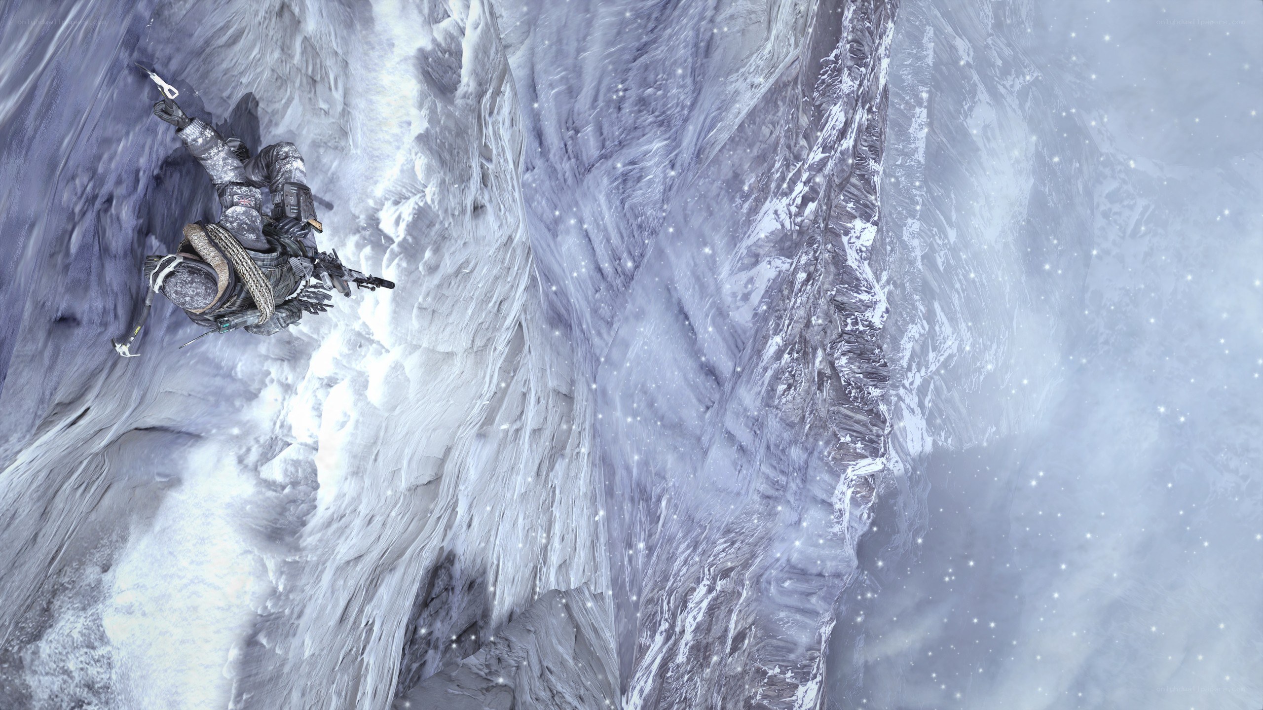 Soldier climbing icy cliff