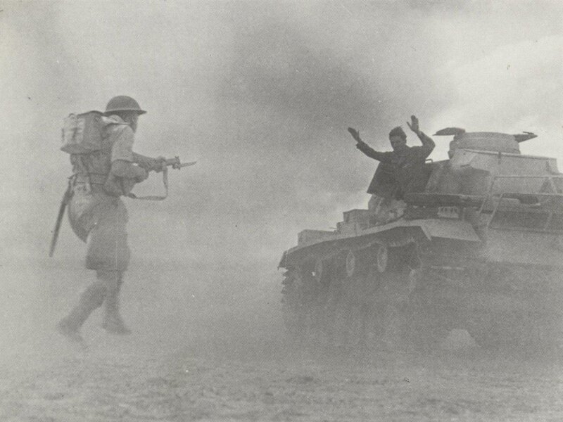 Soldier confronting tank
