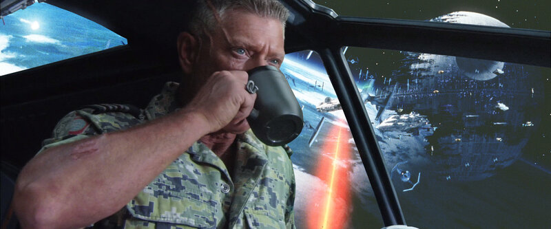 Soldier drinking in cockpit