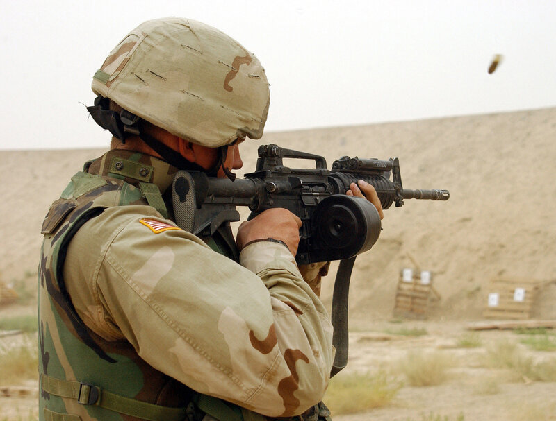Soldier Firing Rifle — Tan