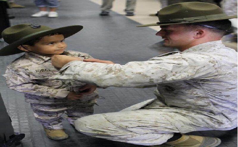 Soldier Helping Child