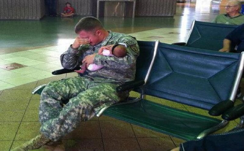 Soldier Holding Baby — Green