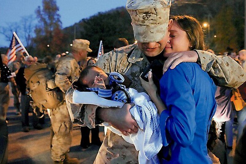 Soldier Holding Baby