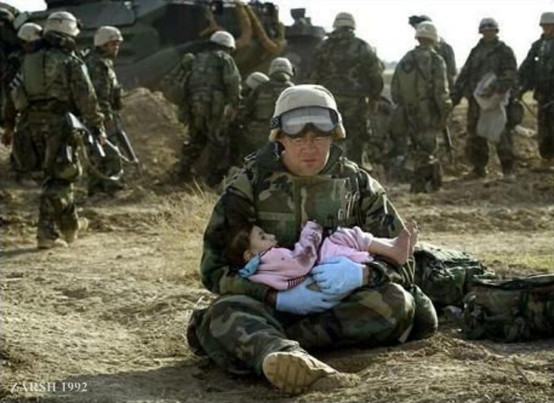 Soldier Holding Child