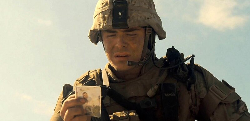 Soldier Holding Photo