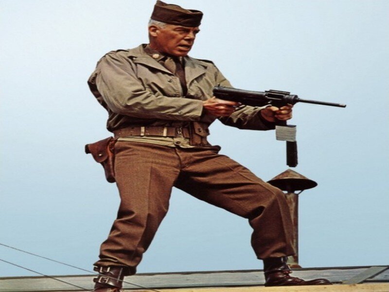 Soldier Holding Rifle — Brown, Dramatic, Photograph