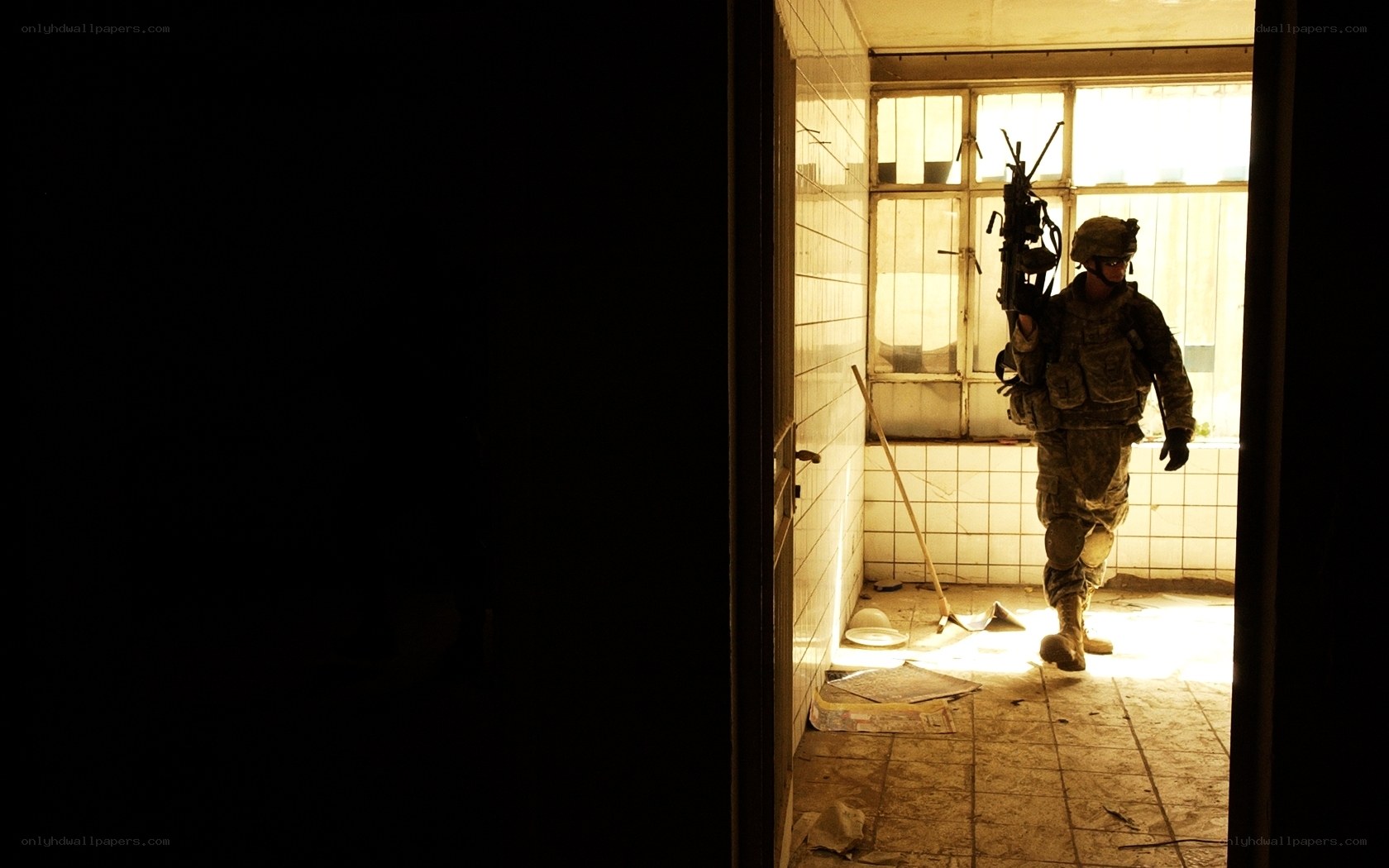 Soldier in a dimly lit room