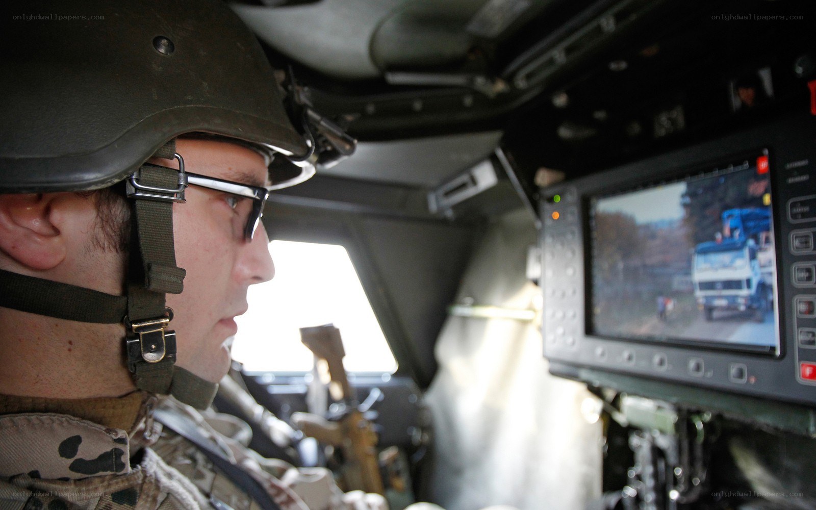 Soldier in armored vehicle