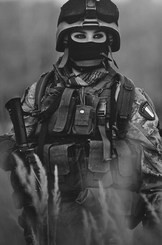 Soldier in Camouflage Gear — Black, Serious