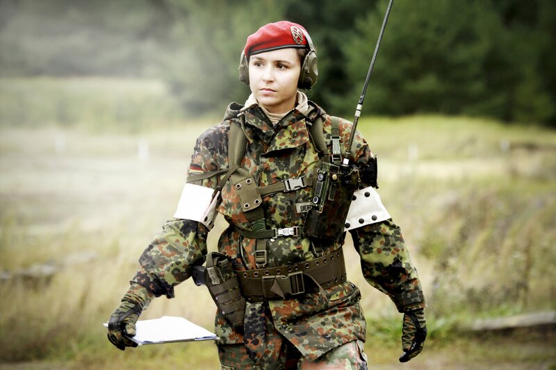 soldier in camouflage uniform