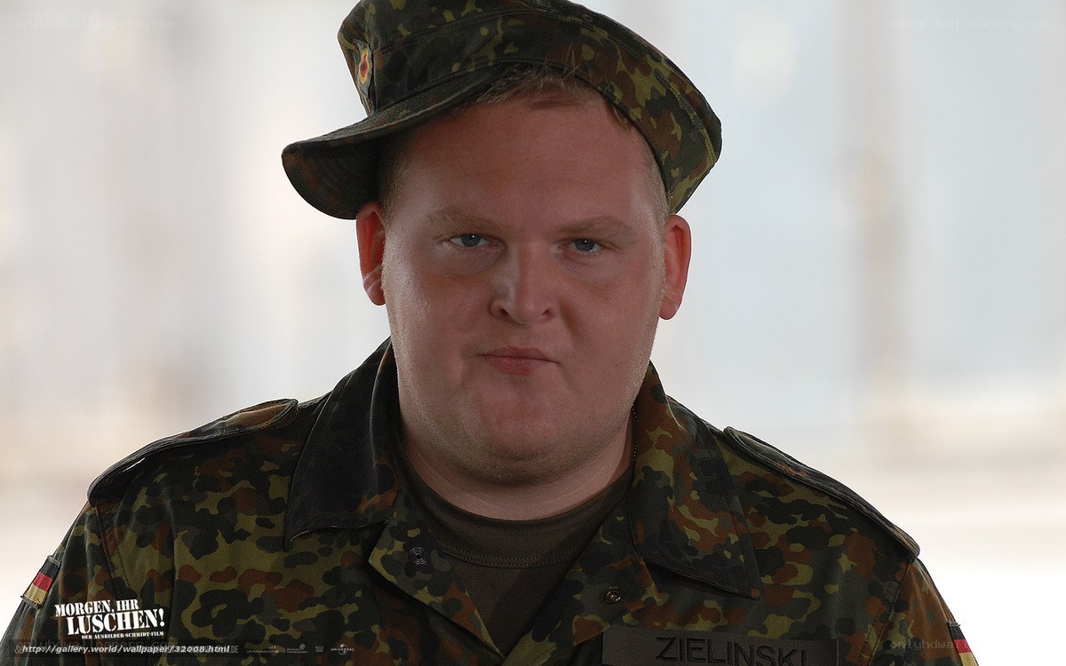 soldier in camouflage uniform