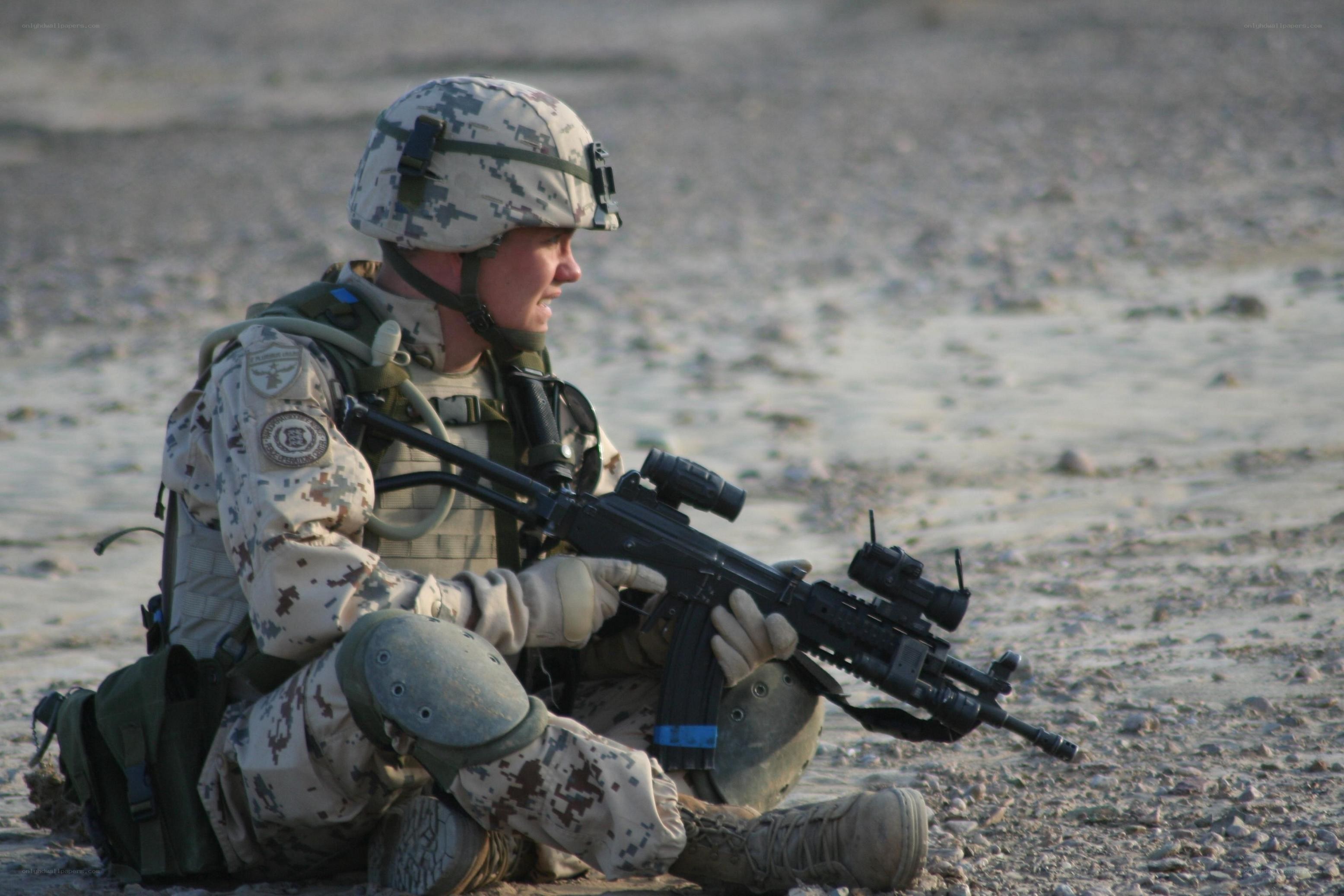 Soldier in desert combat gear