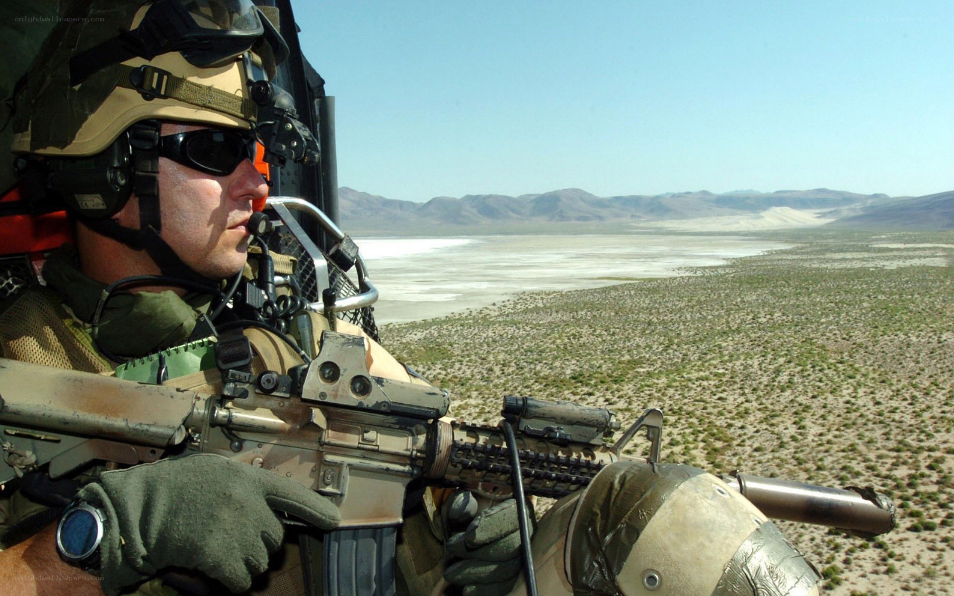 Soldier in desert terrain