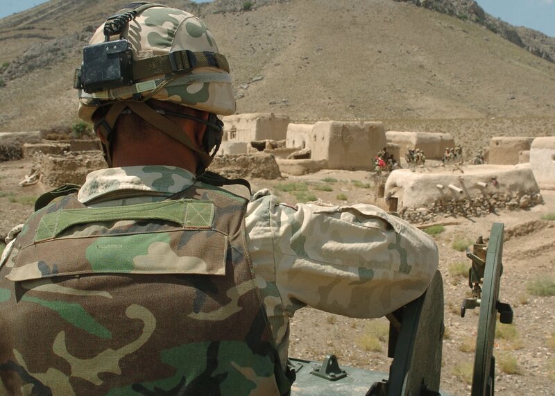 Soldier in desert village