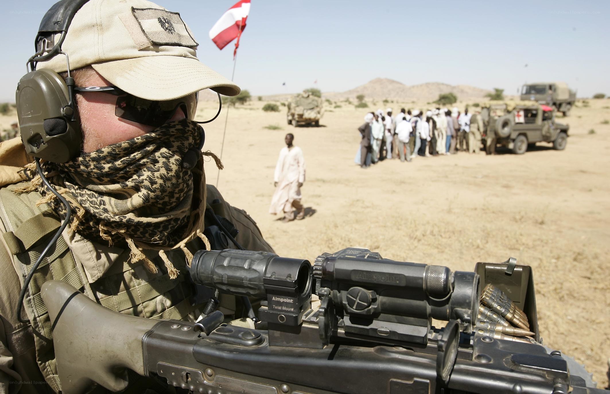 Soldier in desert with rifle