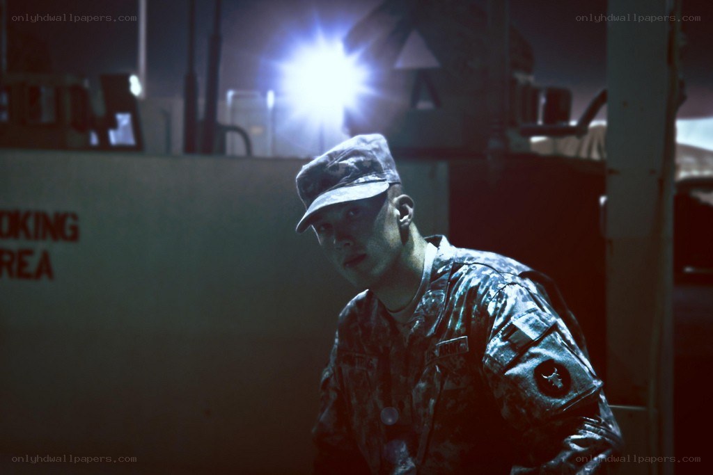 Soldier in dimly lit area