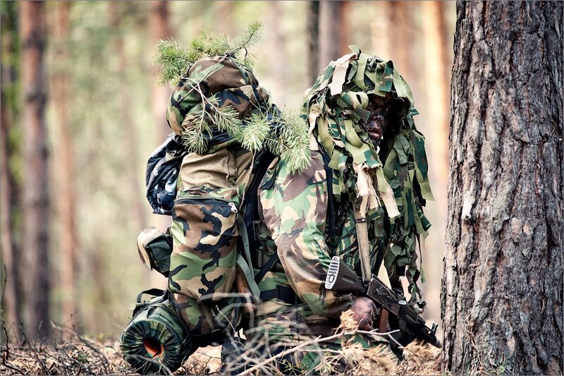 Soldier in forest camouflage