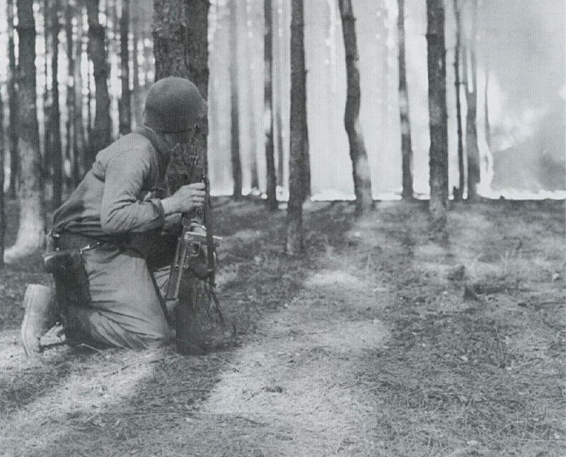 Soldier in forest combat