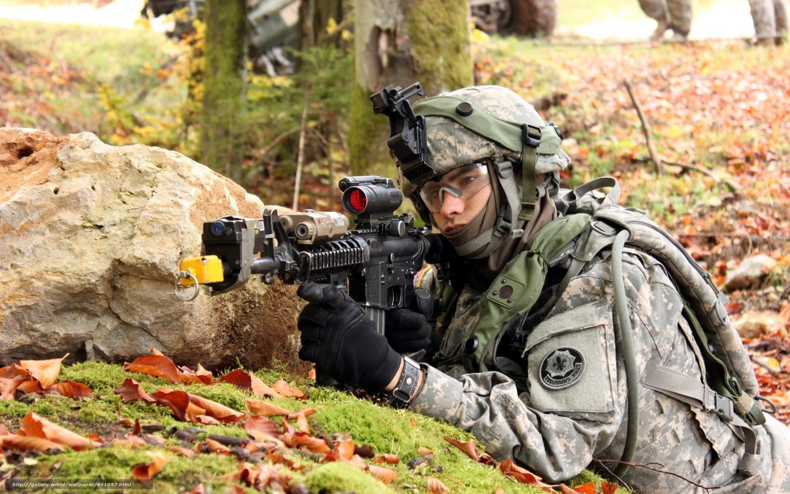 Soldier in forest with rifle
