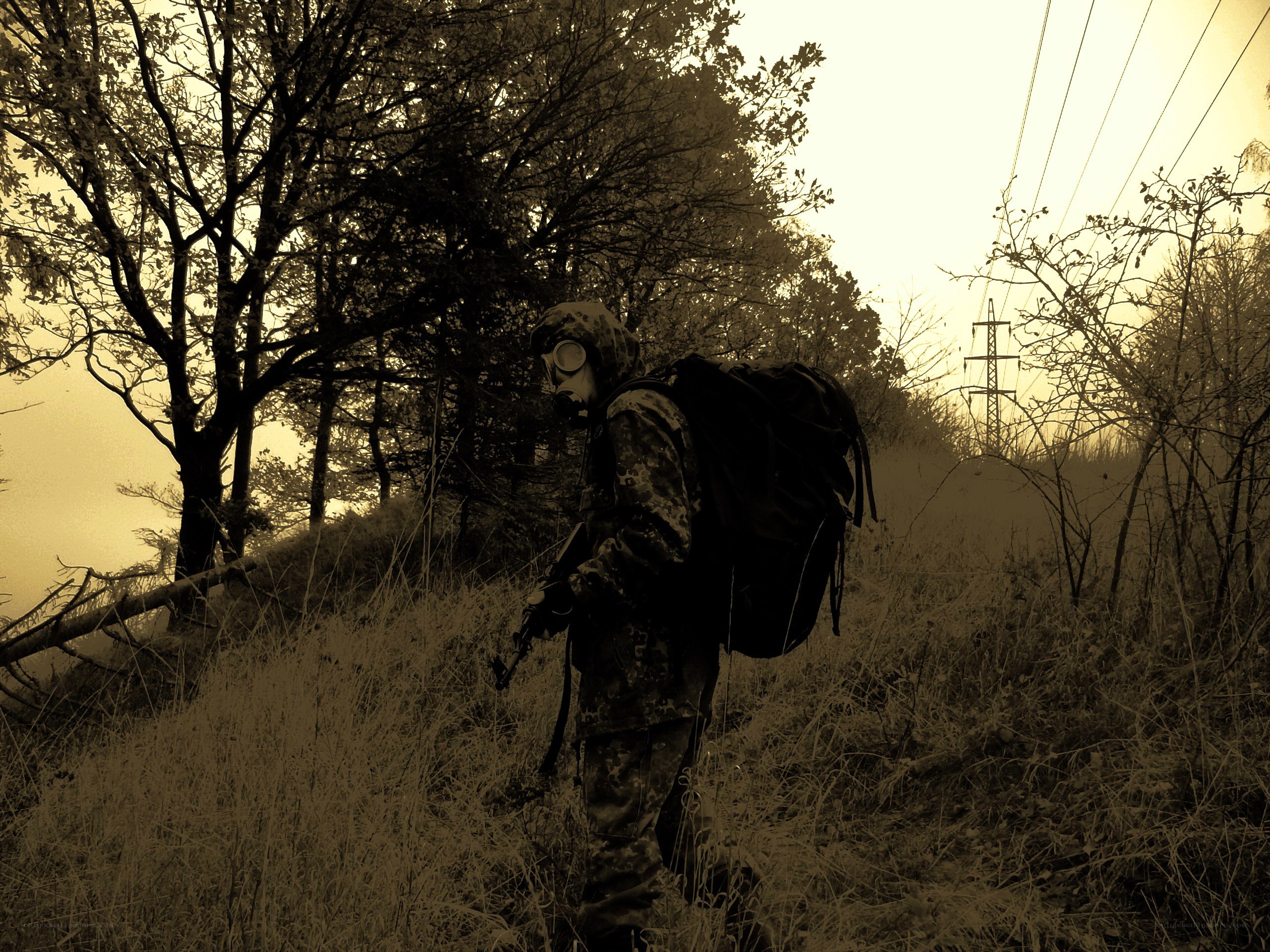 Soldier in gas mask walking