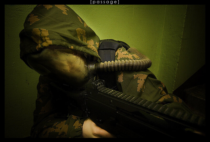 soldier in gas mask with rifle
