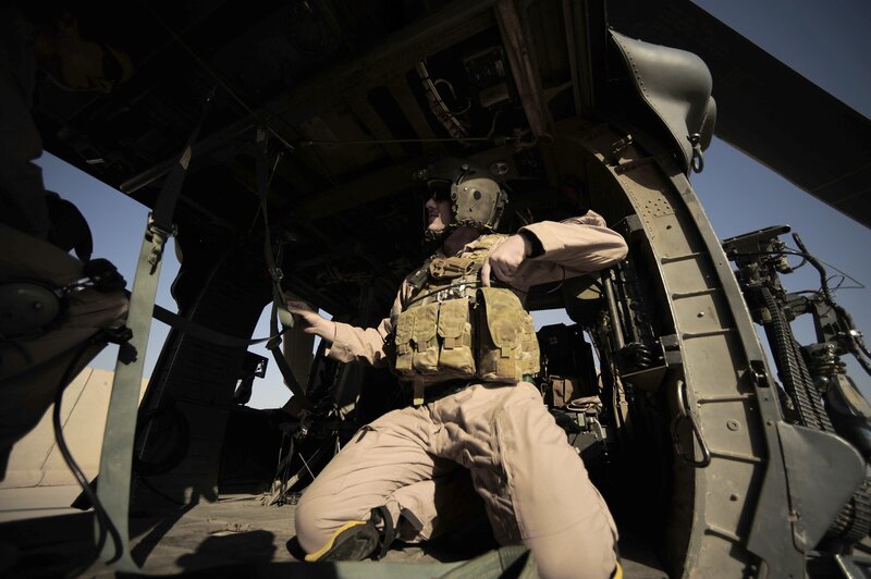 Soldier in Helicopter — Brown, Dramatic, Afternoon, Photograph, Tactical Vest