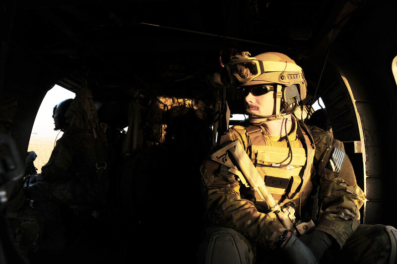 Soldier in helicopter interior