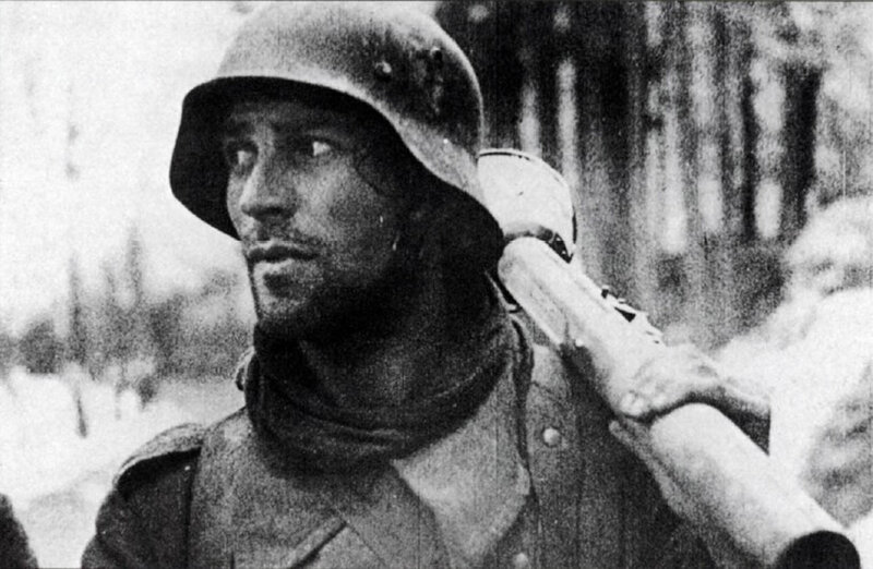 soldier in helmet with rifle