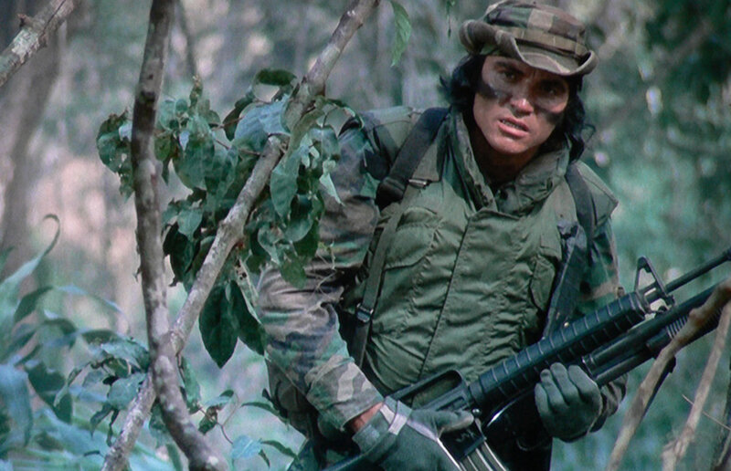 soldier in jungle terrain
