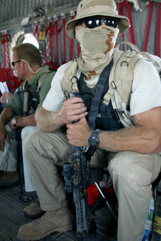 Soldier in military transport
