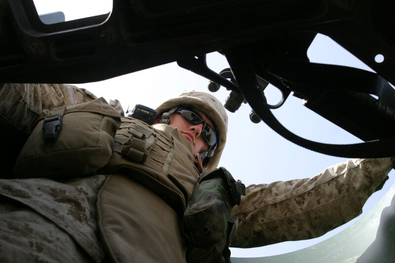 soldier in military vehicle