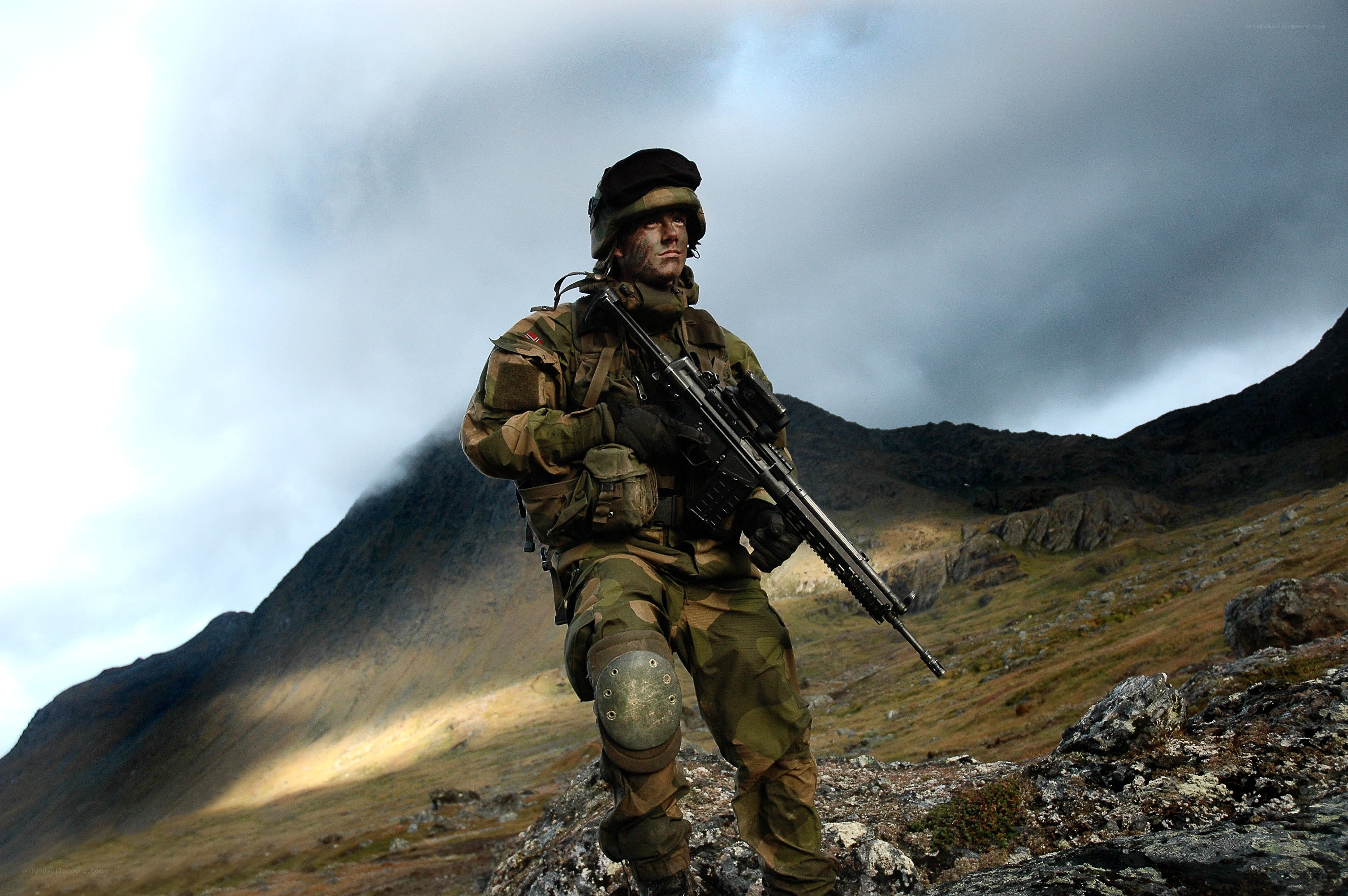 Soldier in mountain terrain