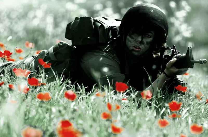 Soldier in poppy field