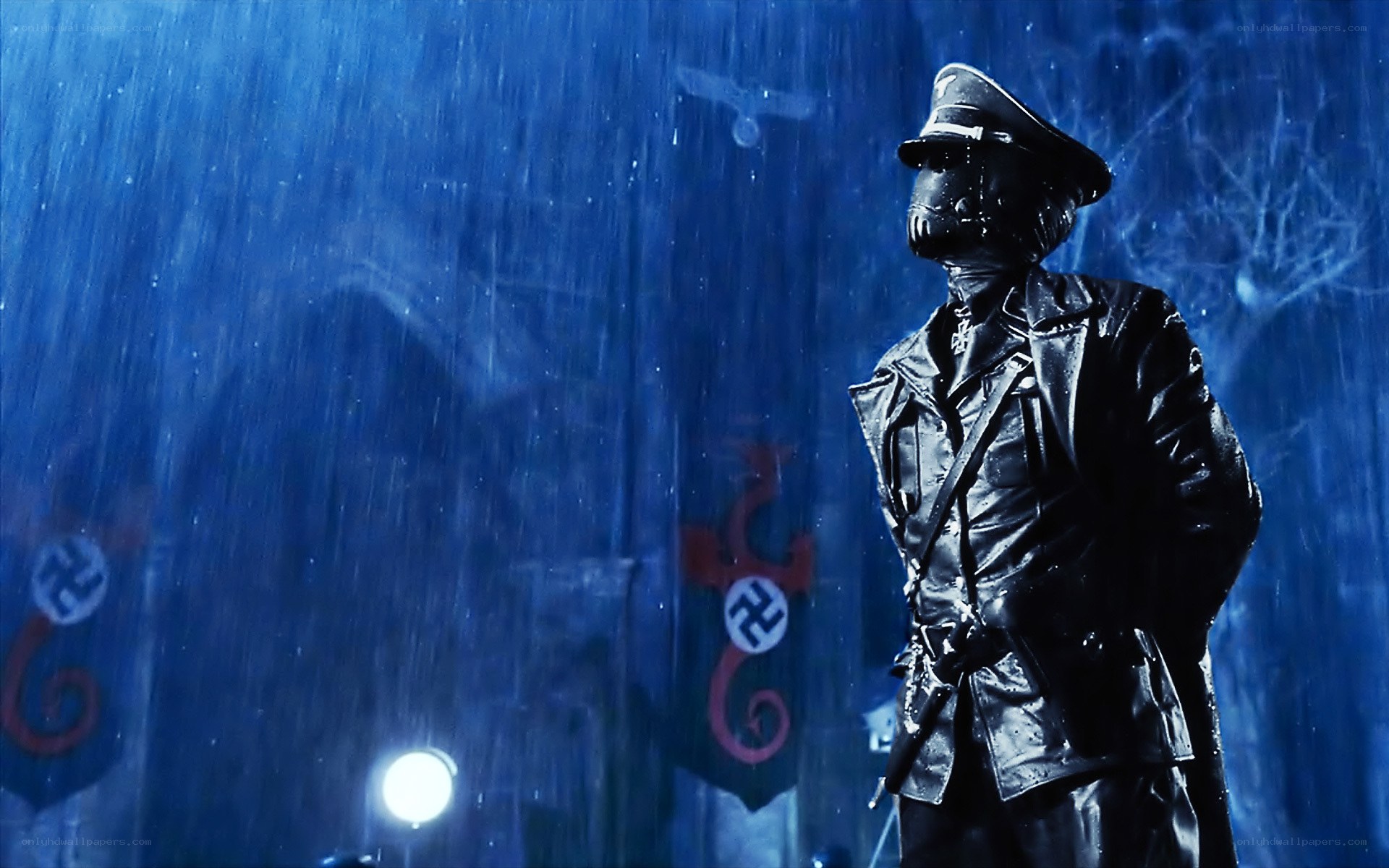 Soldier in rain with swastikas