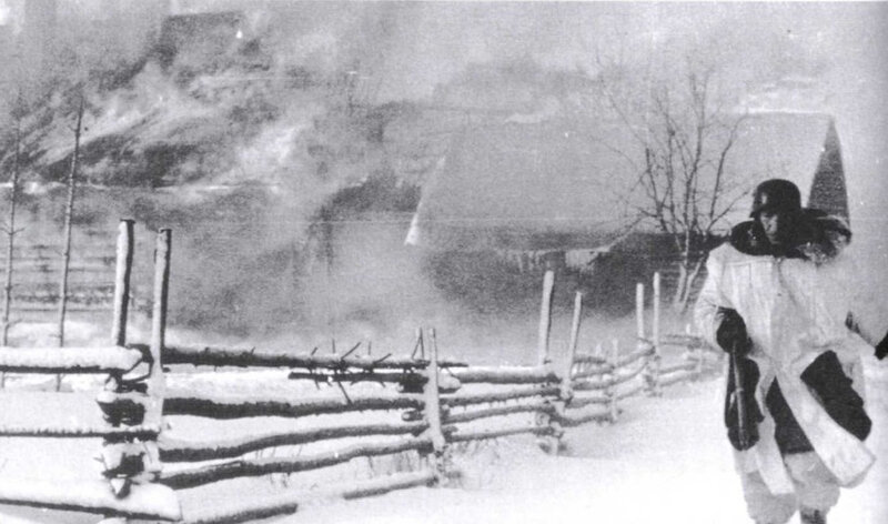 Soldier in snowy village