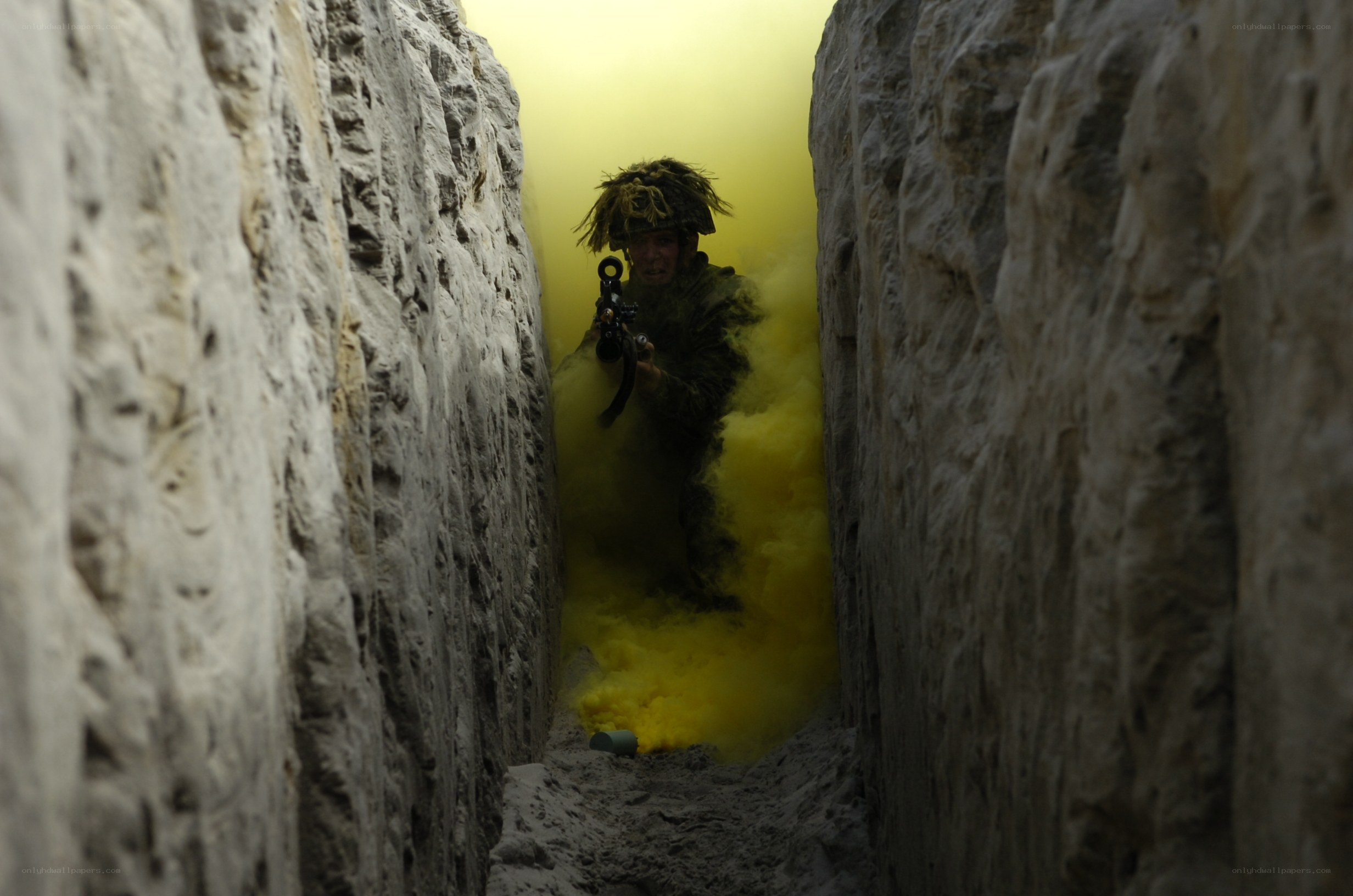Soldier in trench with smoke