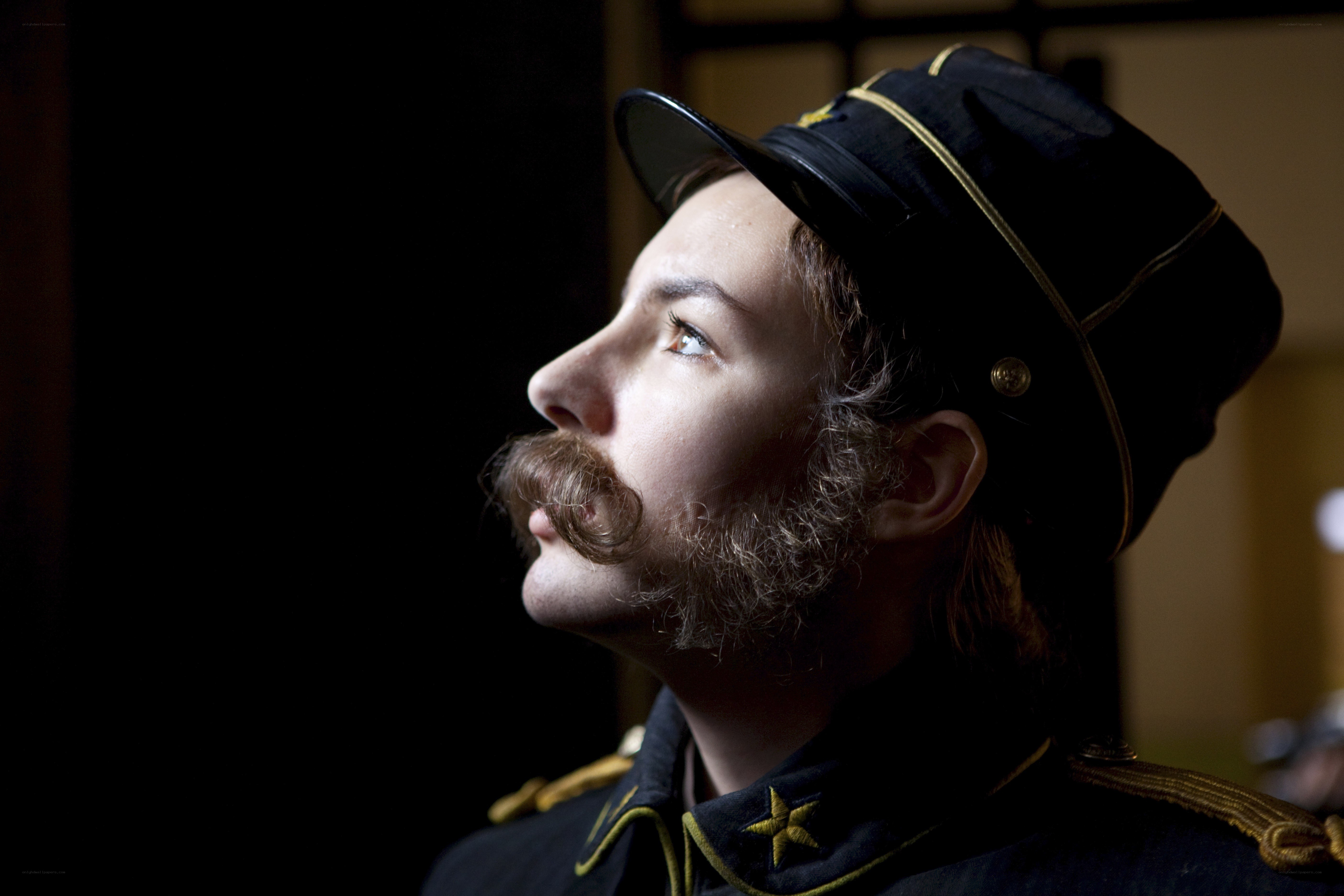 soldier in uniform looking up