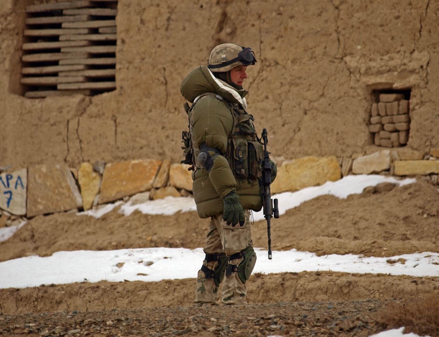 Soldier in winter gear on patrol